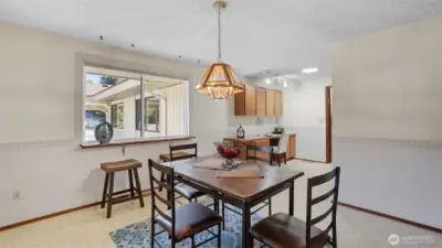 Convenient flow from dining to adjacent spaces, perfect for all your hosting needs.
