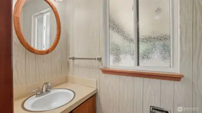Guest-friendly powder room offering convenience and function.