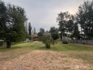 Natural landscaping offers a serene and inviting backdrop.