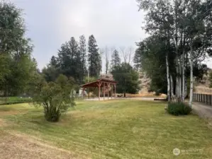 Expansive yard offers plenty of room for yard games, pets, and gardening.