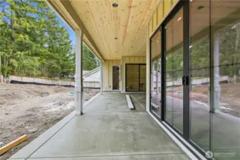 Back side has 3 large sliders that look out to the big yard!