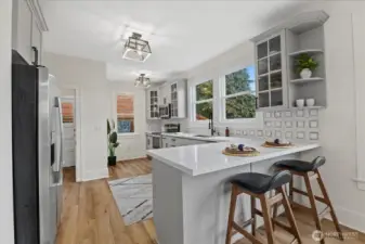 Main Floor Full Kitchen with Countertop Seatting