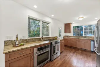 Kitchen- Another view of kitchen with all SS appliances and double ovens with more storage, and soft close drawers with pull-out shelving.