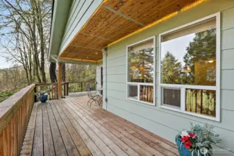 Again, nature awaits, when you step out onto your deck from your Primary bedroom which has access to the back and sides of your home from this amazing wrap around deck,