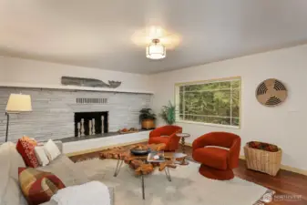 Great big stone fireplace with a mantel begging for holiday decorations.