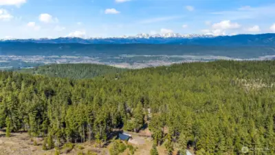 Sweeping territorial views of Cle Elum mountains and forest landscape.