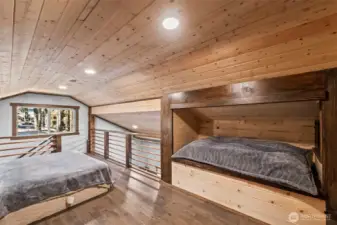 Additional loft sleeping area perfect for guests.
