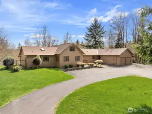 Gated entry, roundabout asphalt driveway