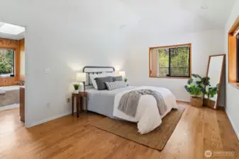 Primary bedroom has its own wing of home.