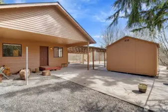 Covered patio and storage shed.