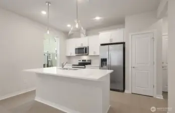 View of kitchen from cafe area