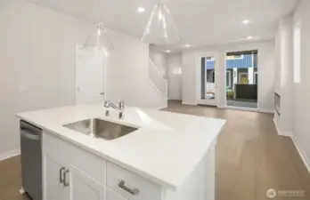 Facing stairs from kitchen