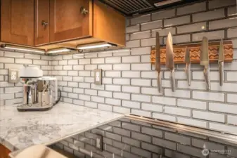 Gorgeous custom tiling through out the whole kitchen