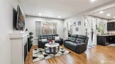 Virtually staged. Gatherings are easy with the living room open to the kitchen and dining room.