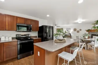 Granite counters with abundant working space.
