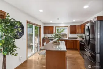 Kitchen island adds additional dining space.