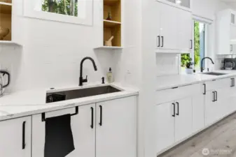 Two large sinks, in the kitchen and in the pantry