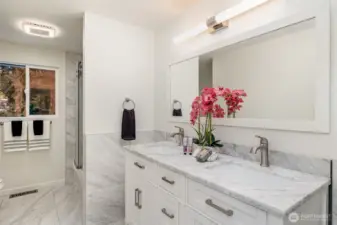 Modern, updated bathroom with a double sink vanity