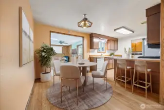 Virtually Staged.Dining space that flows easily to the living room and kitchen, making gatherings effortless.