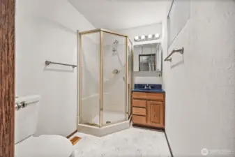 Attached en-suite bath includes a walk-in shower for added privacy and convenience.