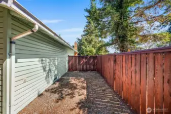 Spacious backyard with plenty of room to play, garden, or entertain. Bonus side yard offers ideal space for storing outdoor toys.