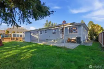 Spacious Covered Patio in Backyard.