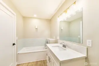 Light and bright with tiled tub