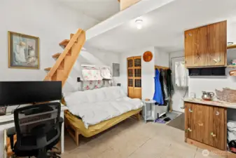 Storage and bathroom near front door