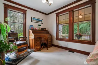 A dedicated office space just off the foyer allows for home organization for paper and computer work.