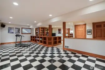 Custom woodwork continues into the lower level.  Imagine the uses for this space!  It is endless.