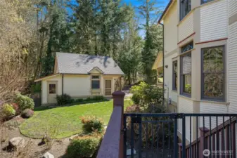 The detached garage includes a storage/potting shed great for yard tools.