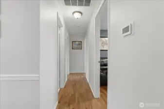 Hallway to bedrooms and bathroom.