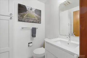 Convenient sparkling clean half bath right off the laundry/mudroom.