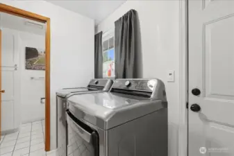 Laundry/mudroom has access door to back yard. Washer and dryer included in the sale of the home.