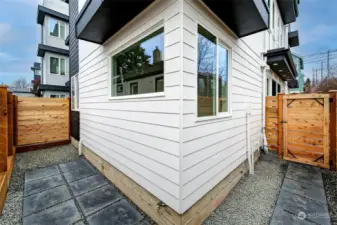 This unit offers a small fences patio and yard space.
