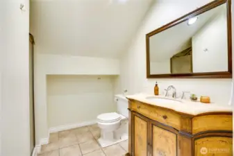 This 3rd bathroom includes a tiled shower heated by a water heater dedicated just to this level of the home.