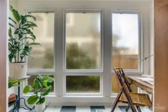 While the warmth and glow of the fireplace draws attention in the evenings, this little conservatory glows in the morning and afternoon light. This feature of the home is mentioned in the earliest descriptions—your beloved houseplants can continue the tradition of green and growing things enlivening this home for the last 120 years.