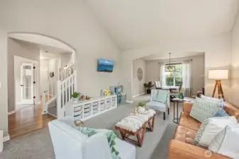View to entryway and office entry from formal living