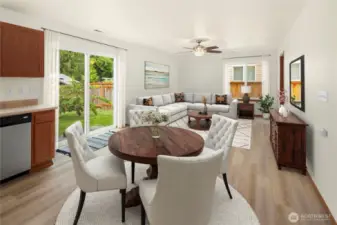 Virtually staged dining and great room.  Ceiling fan and light is real.  A place to relax and unwind.