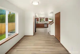 Welcomes your guests into this flexible space - living room, reading area or dining room.