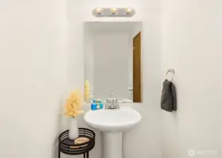 Powder room off great room.