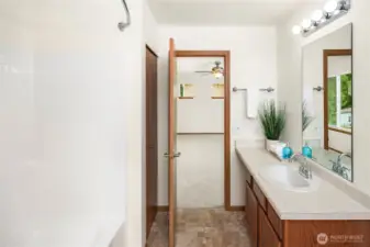 Look at the extra deep shelves in the closet behind the door leading to the bathroom!  Costco size storage!