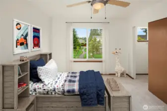Bedroom #2 - Notice the window in the closet for natural light?   Ceiling fan for added comfort.  New paint and new carpeting and padding.