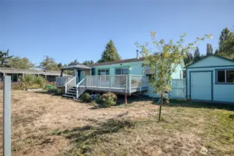 Large deck w/hot tub and pergola off of living room