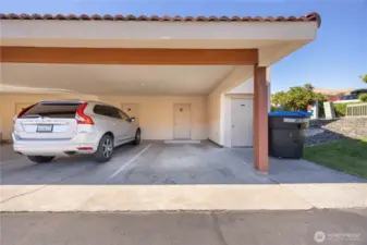 Dedicated carport and storage unit.