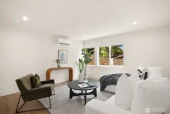 Entry level family room/den is adjacent to a bedroom and full bath. Perfect au pair or MIL area.