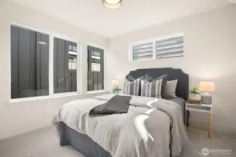 One of the additional bedrooms on the upper level.
