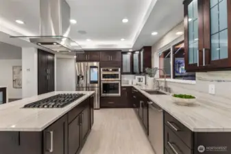 Generous storage runs from the ceiling to the floor, where radiant porcelain tile warms you underfoot.