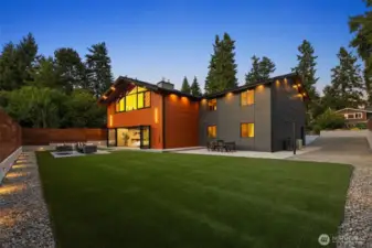 Garage includes EV charger, laundry with cabinetry, and LiftMaster myQ WiFi opener for remote access.