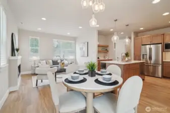 Durable luxury vinyl plank flooring throughout the main floor